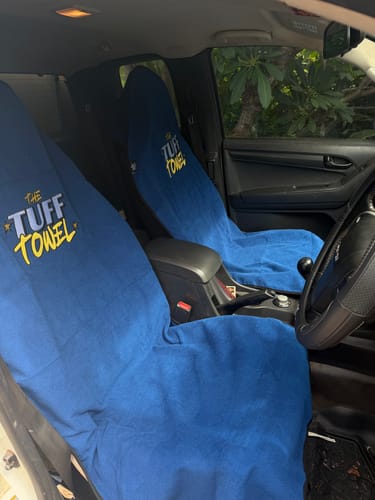 Customer's two navy blue Waterproof Car Towel Seat Covers fitted onto the front seats of a vehicle.