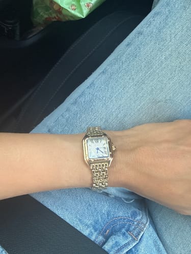 Reviewer showing their gold-colored Vienna Watch on their wrist.