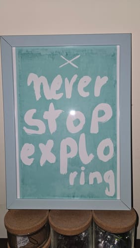 Customer photo review of Never Stop Exploring, Motivational Poster