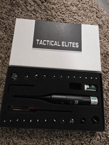 Customer's Site Right Adapters and bore sight tool neatly arranged in the open product box.