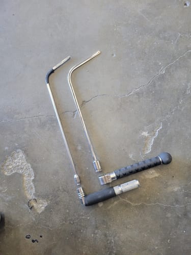 Customer's Tequila Tools Door Lord Blade Hub set, with two blades and two handles, laid out on a concrete floor.