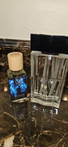 Reviewer's bottle of The Live Blues perfume next to an older bottle of Live Jazz for comparison.