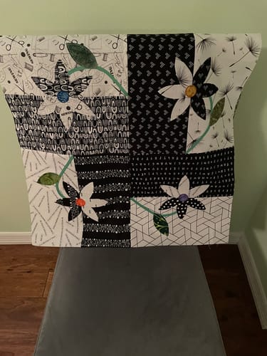 Reviewer's quilt top made with various patterned black and white Scissors Fabric.