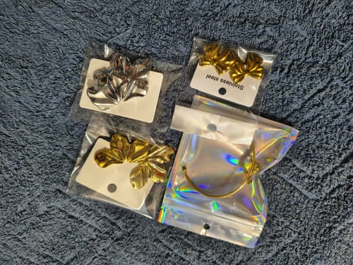 Customer photo review of Aretes moños dorados- acero inoxidable