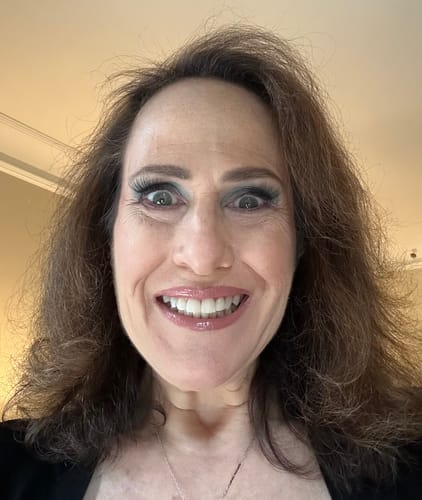 Reviewer's happy selfie showing radiant skin after using Grass Fed Tallow & Honey Balm.