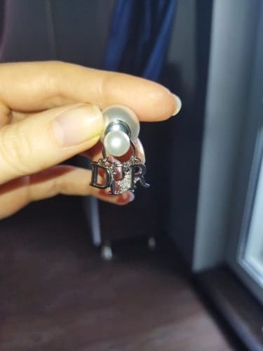 Customer photo review of Elegant Business Pearl & Star Stud Earrings for Women Fashionable Travel Banquet Party Jewelry Accessory