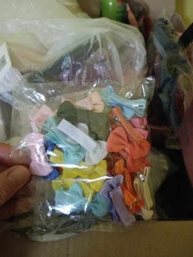 Customer photo review of 30 colored random bow fabric hair clips suitable for daily use as hair accessories