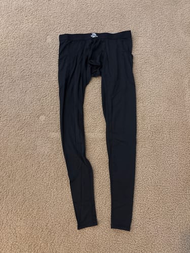 Customer's black Nylon 28in Leggings laid out flat on a carpeted floor.