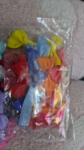 Customer photo review of 30 colored random bow fabric hair clips suitable for daily use as hair accessories