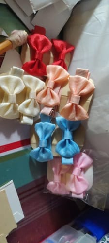 Customer photo review of 30 colored random bow fabric hair clips suitable for daily use as hair accessories