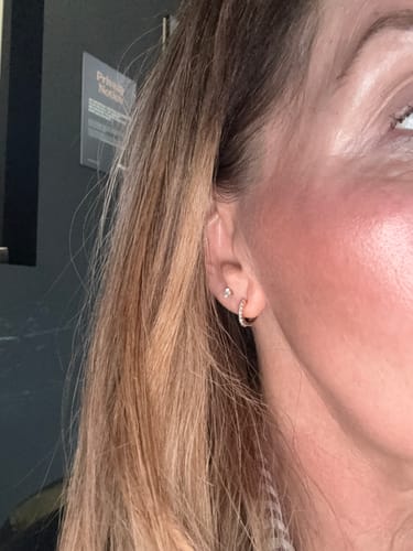 Customer photo review of Versa Single Spark Lab Grown Diamond Huggies Hoop Earrings