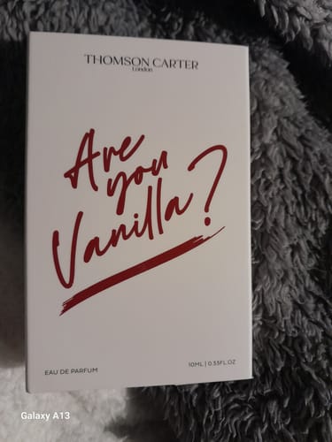 Customer's white box for the Are You Vanilla Night Eau de Parfum, shown on a fluffy grey blanket.