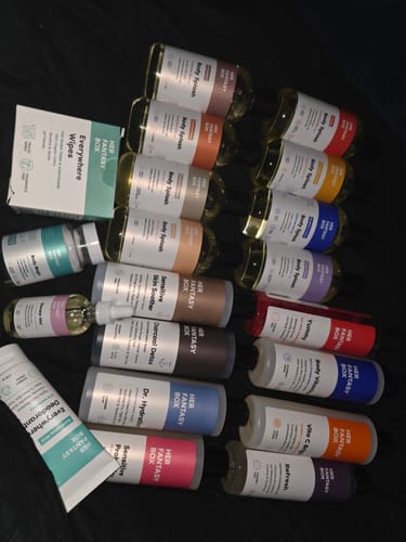 Reviewer's complete Everything Body Care Bundle laid out, showing the colorful collection of body care products.
