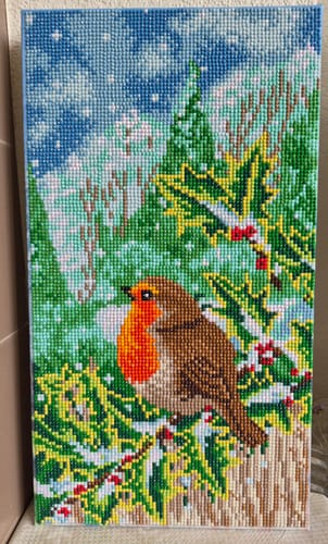 Reviewer's finished Crystal Art canvas showing a sparkly robin perched on a snowy holly branch.