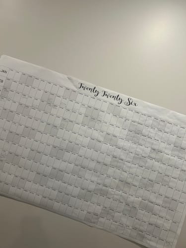 Reviewer's 2026 Yearly Calendar laid out, showing the full yearly grid before use.