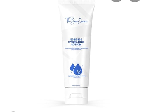 A customer's white tube of Essense Hydrating Lotion, shown standing upright.