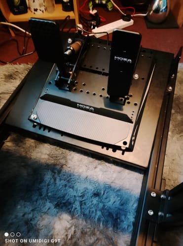 Customer's MOZA RACING CRP2 Pedals installed on a black sim racing rig.