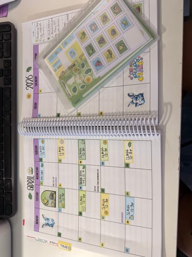 Customer shows their planner decorated with cute 'Cute Critters' stickers from the Ultimate Subscription box.