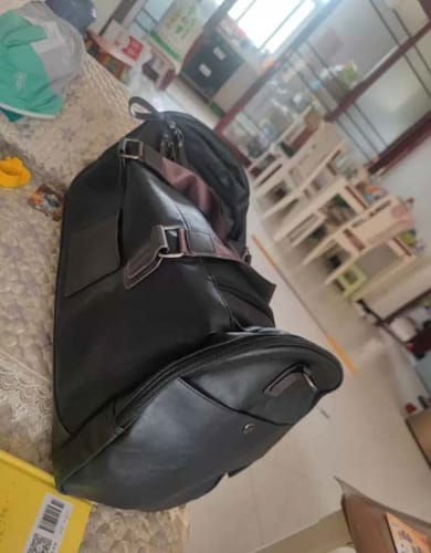 Customer photo review of Premium Leather Weekender Travel Bag for Men