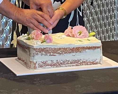 Customer photo review of floral sheet cake