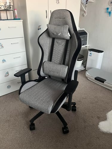 Customer's PRO Series - GEN 2.0 gaming chair in textured grey fabric, fully assembled in a room.