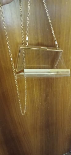 Customer's transparent acrylic Square Chains Lock bag held open, showing the gold hardware and chain.
