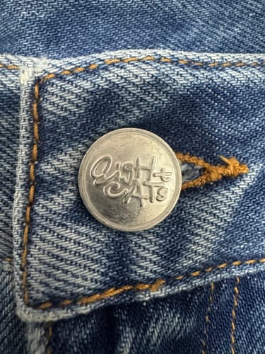 Customer photo review of Zoe Mid-Rise Denim Mini Shorts