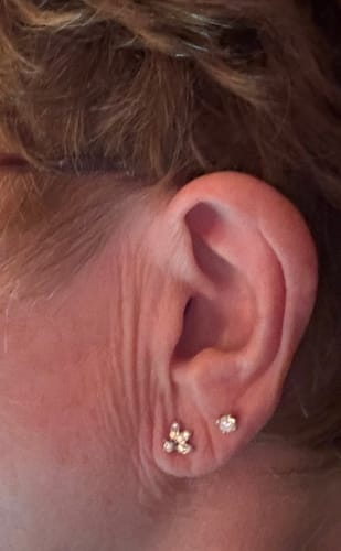 Customer photo review of Versa Lab Grown Diamond Petal Glow Sleep Stud Earrings