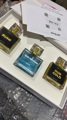Customer's Khushboo-e-Ramzan bundle showing the three perfume bottles, Rumi, Oud Nirvana, and Oud Gold, inside a white box.