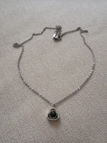 Reseña con foto de un cliente sobre Collar con Foto Dentro "Corazón Eterno"