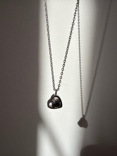 Reseña con foto de un cliente sobre Collar con Foto Dentro "Corazón Eterno"