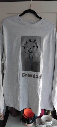 Customer's grey long sleeve t-shirt with a custom print of a child's drawing above the word 'Grandad'