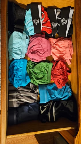Customer's wooden drawer filled with a colorful collection of Modal 0in Thongs.