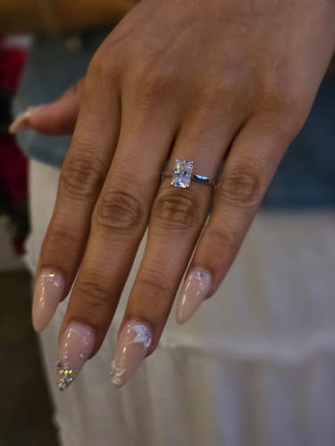 Customer photo review of Alia 2 Carat Radiant Cut Solitaire Moissanite Engagement Ring in 925 Sterling Silver