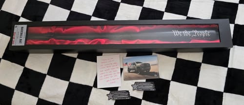 Customer's 'We The People' Collectors Baseball Bat in its black presentation box with red satin lining.