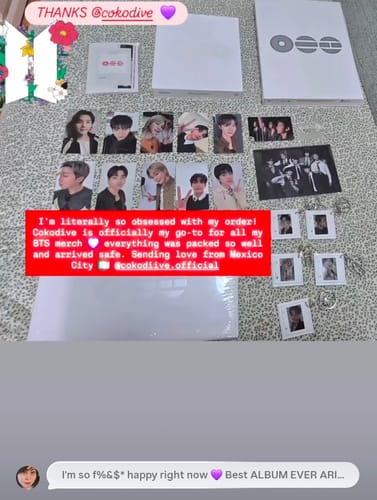 Reviewer's BTS album set unboxed and displayed, showing albums, many photocards, and gift keyrings.