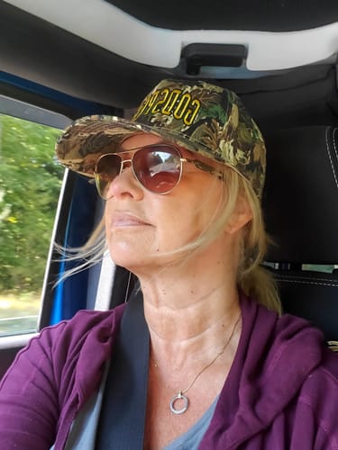 Reviewer's close-up photo showing her face and neck skin after using F-Balm.
