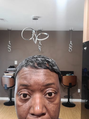 Customer showing a close-up of their face after using the Turmeric Fade & Glow Bar.
