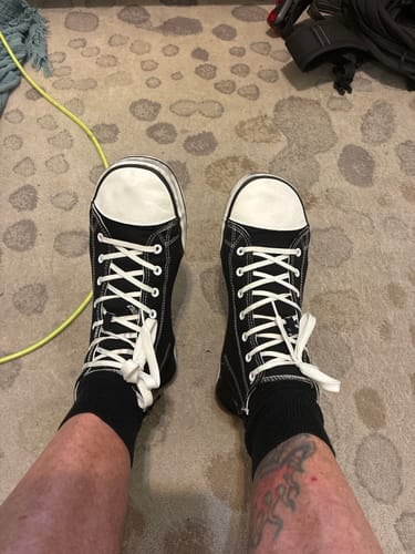 Customer's view looking down at their black Roam I - Barefoot Shoes, highlighting the roomy toe box.