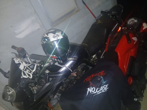 Customer photo review of No Face No Case Crewneck Sweatshirt
