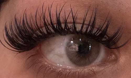 Close-up of a customer's eye wearing the dramatic, spiky Manga lashes.