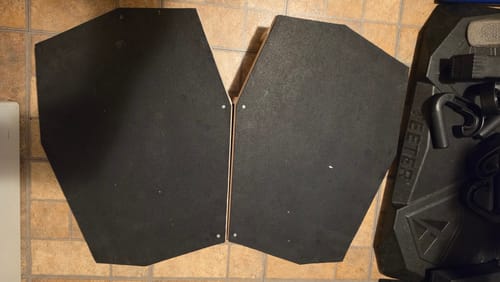 Reviewer's 'The Deck' prototype, showing the two separate black platforms on a tile floor.
