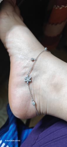 Customer wearing the delicate Silver Zircon Bubble Anklet, showing the zircon centerpiece on their ankle.