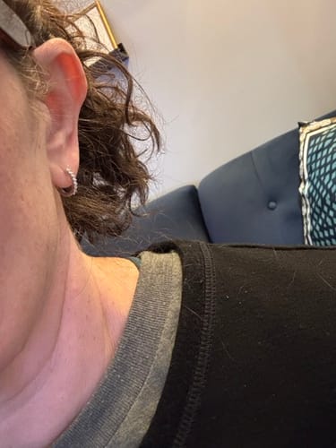 Customer photo review of Versa Single Spark Lab Grown Diamond Huggies Hoop Earrings