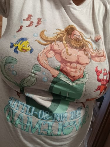 Close-up of a customer wearing the gray Not-So-Little Swolemaid T-Shirt with its funny graphic.