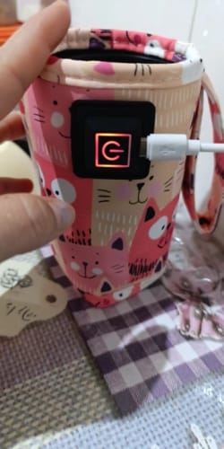 Customer photo review of Calentador de Biberones Portátil USB