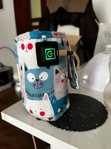 Customer photo review of Calentador de Biberones Portátil USB