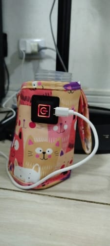 Customer photo review of Calentador de Biberones Portátil USB