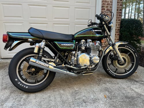 Customer's vintage motorcycle where the Tracking card is hidden.