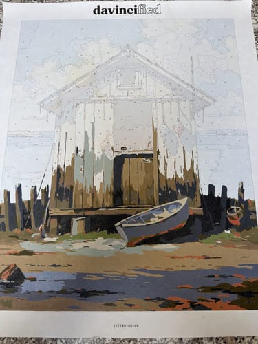 Customer's partially painted canvas from the Weathered Fishing Shack by the Sea paint by numbers kit.